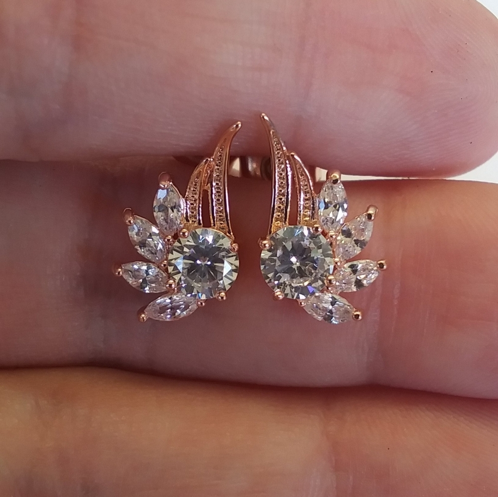 Rose gold angel wing studs
